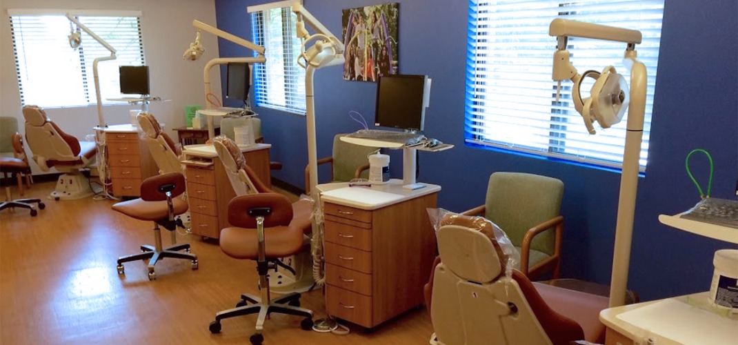 Row of orthodontic treatment chairs