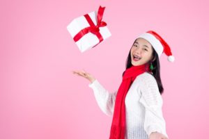 Girl with braces in New Hampshire catching holiday present 